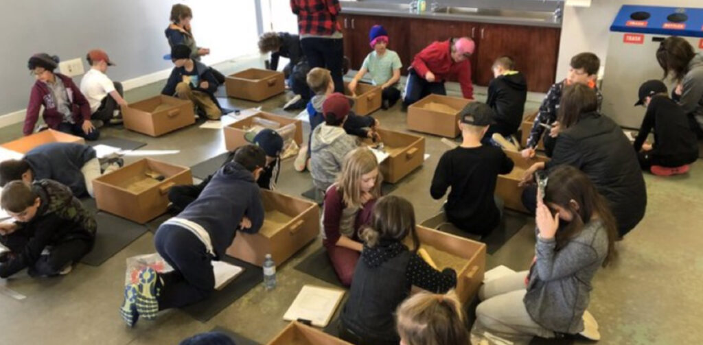 These students are practicing their archaeological skills. Taking the learning out into the community and engaging in hands on activities happens as much as possible.